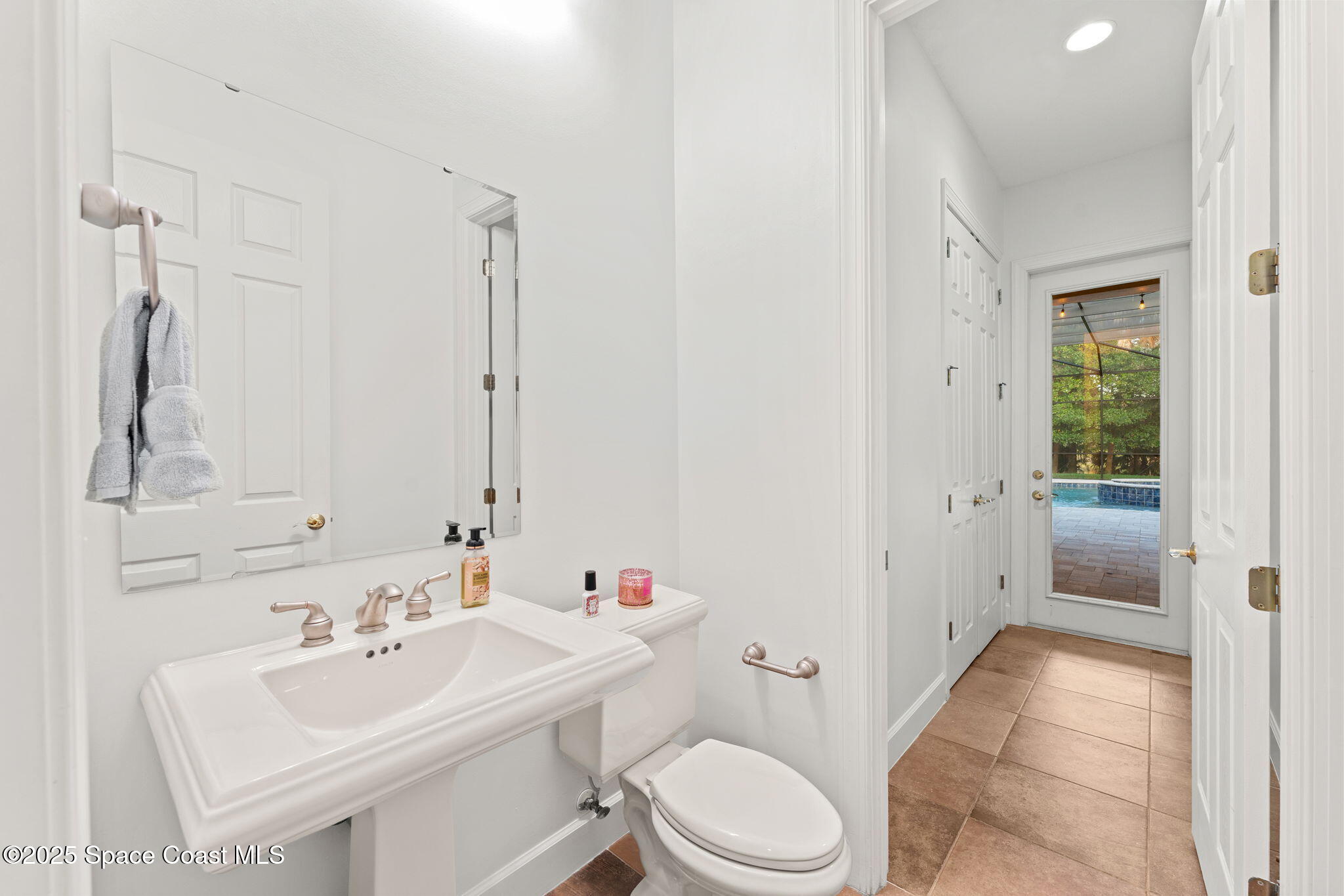 4447 Reseda Way Rockledge, FL 32955 - Photo 41 of 87 a bathroom with a sink a toilet and shower