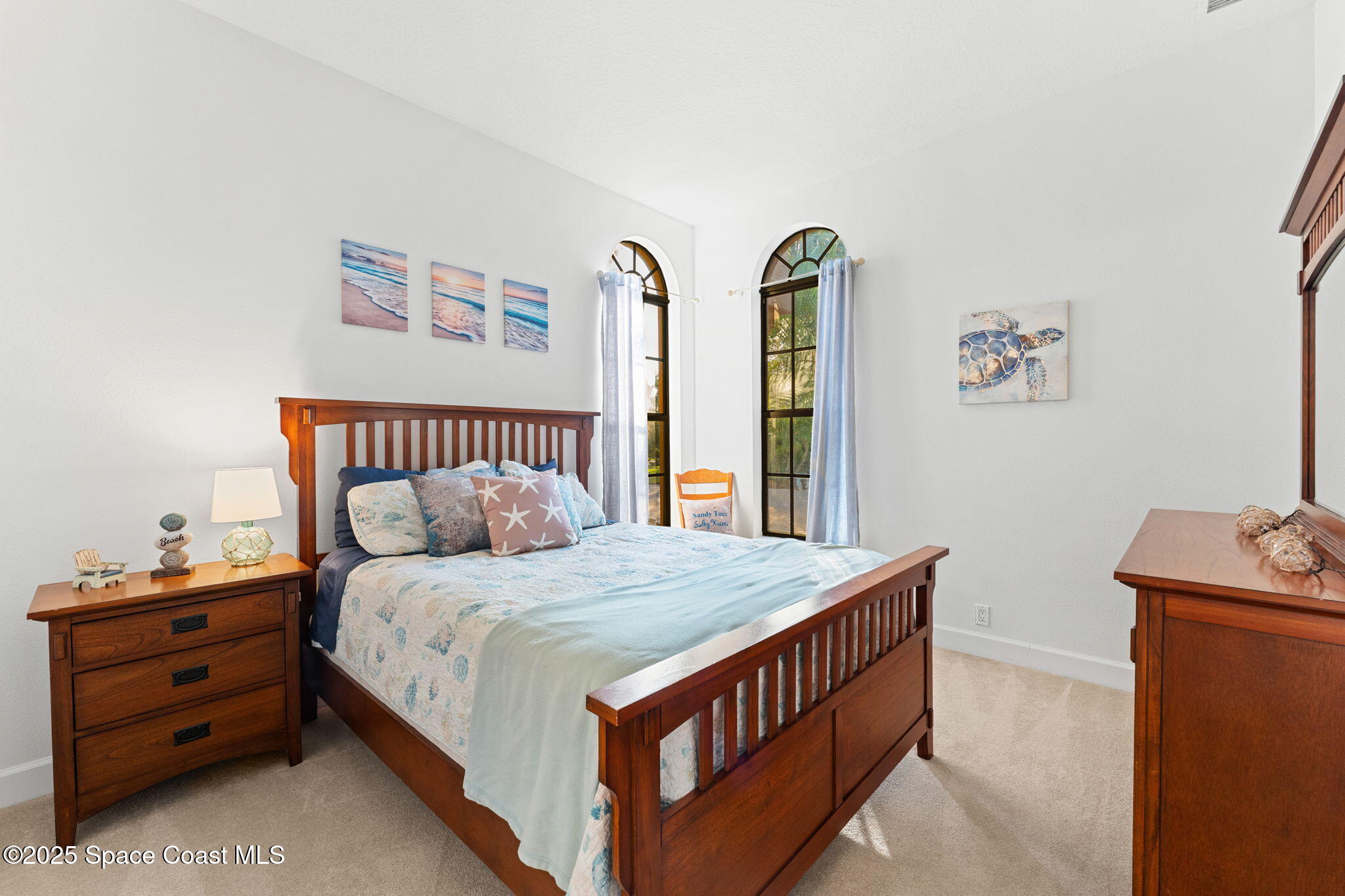 4447 Reseda Way Rockledge, FL 32955 - Photo 46 of 87 a bedroom with a bed and a baby crib