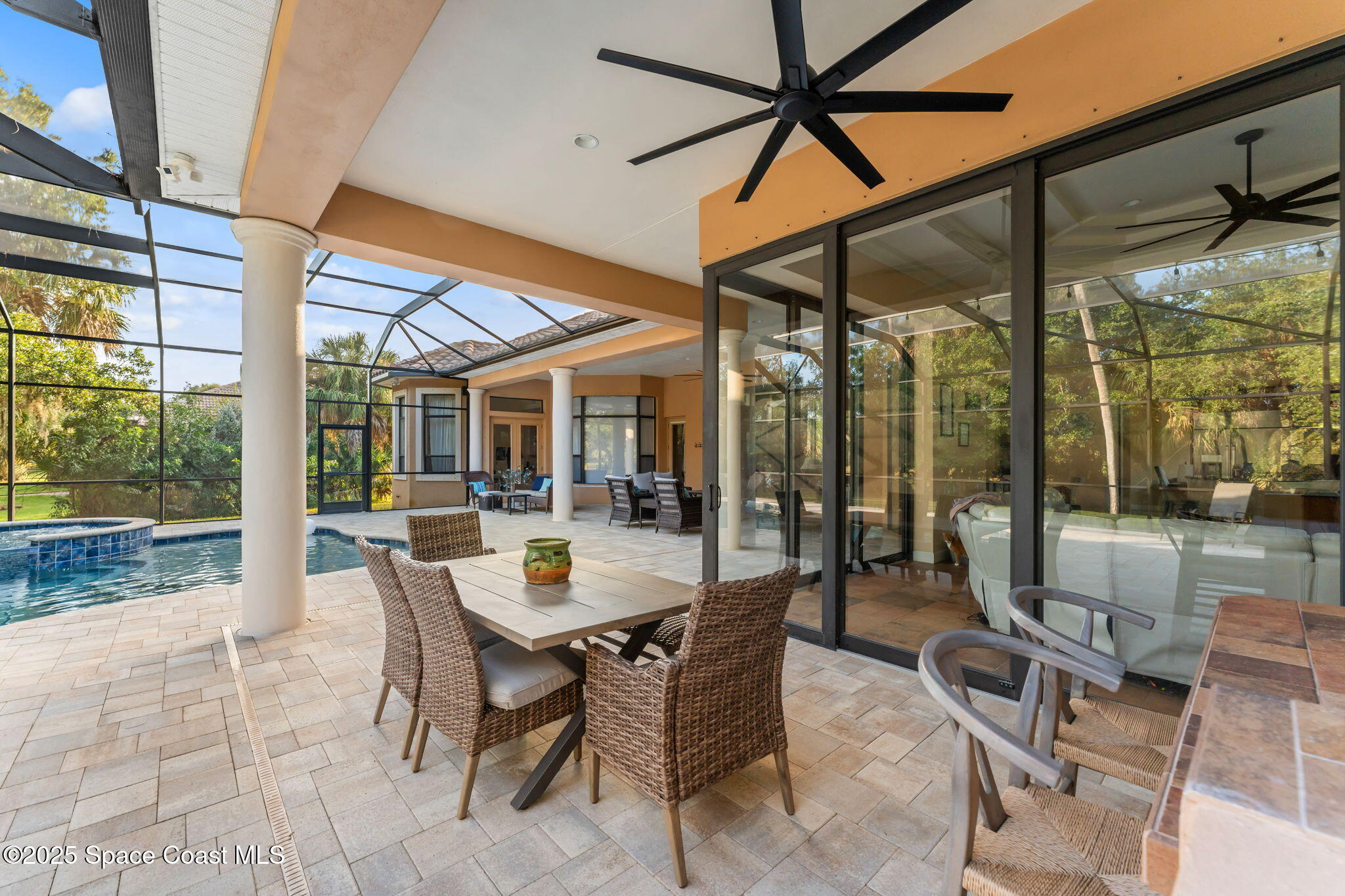4447 Reseda Way Rockledge, FL 32955 - Photo 60 of 87 a dining area with furniture and outdoor view