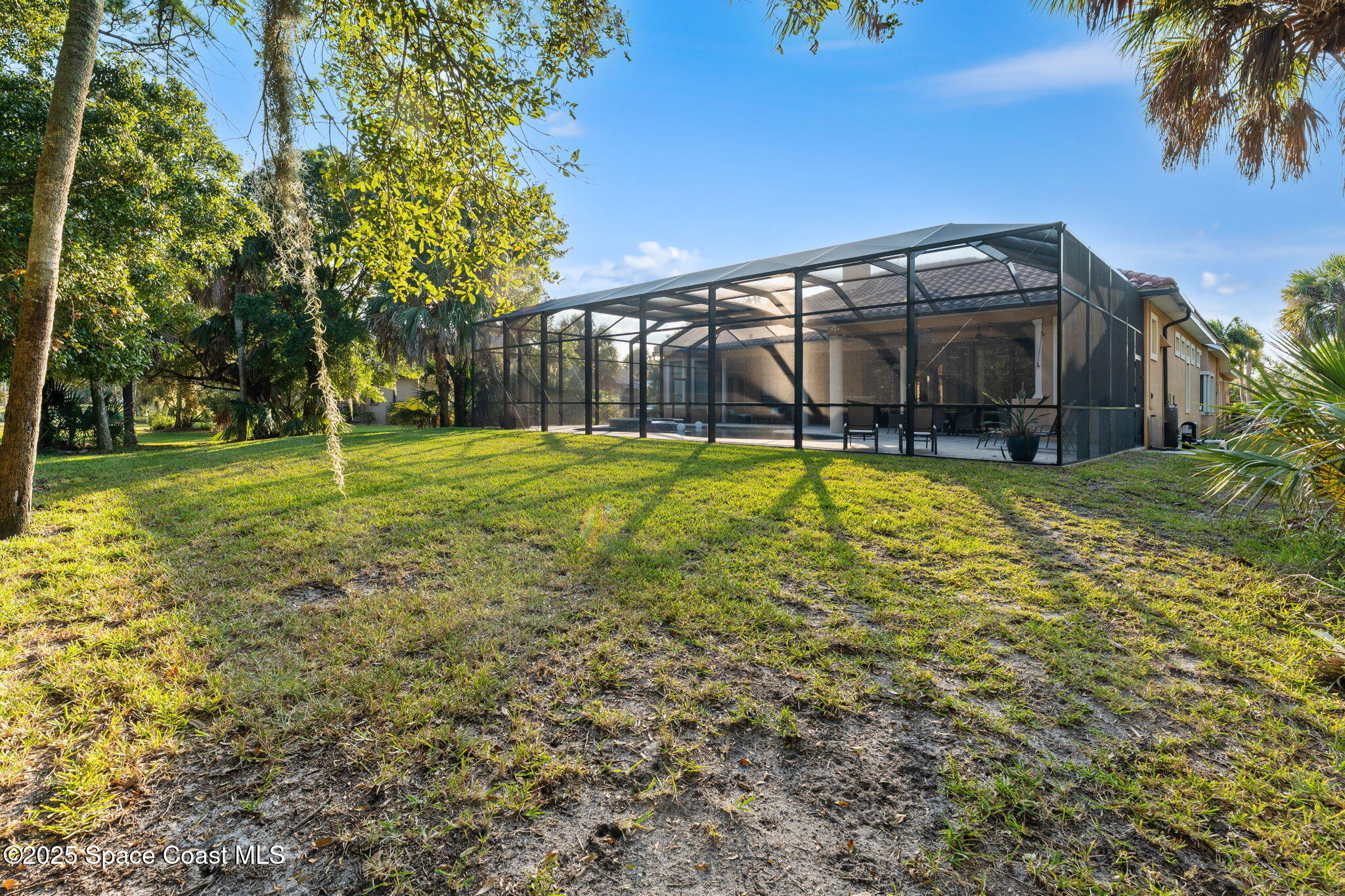 4447 Reseda Way Rockledge, FL 32955 - Photo 70 of 87 a view of a house with a yard