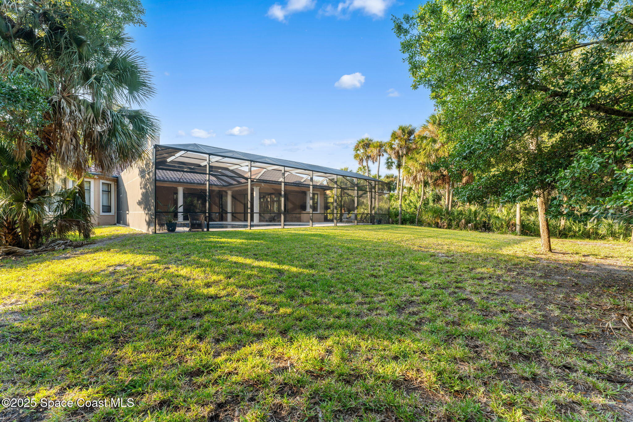 4447 Reseda Way Rockledge, FL 32955 - Photo 71 of 87 a view of a house with a big yard