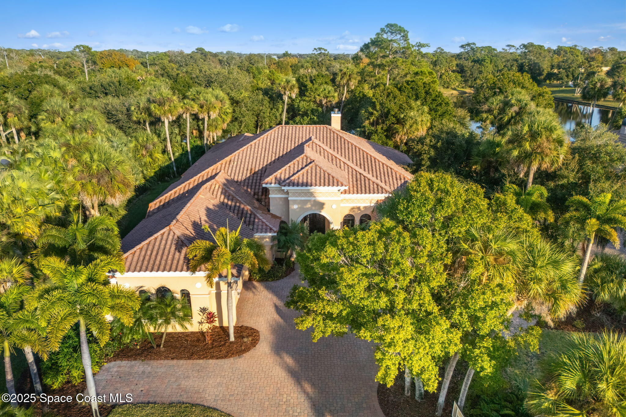 4447 Reseda Way Rockledge, FL 32955 - Photo 75 of 87 a view of a house with a yard and a tree