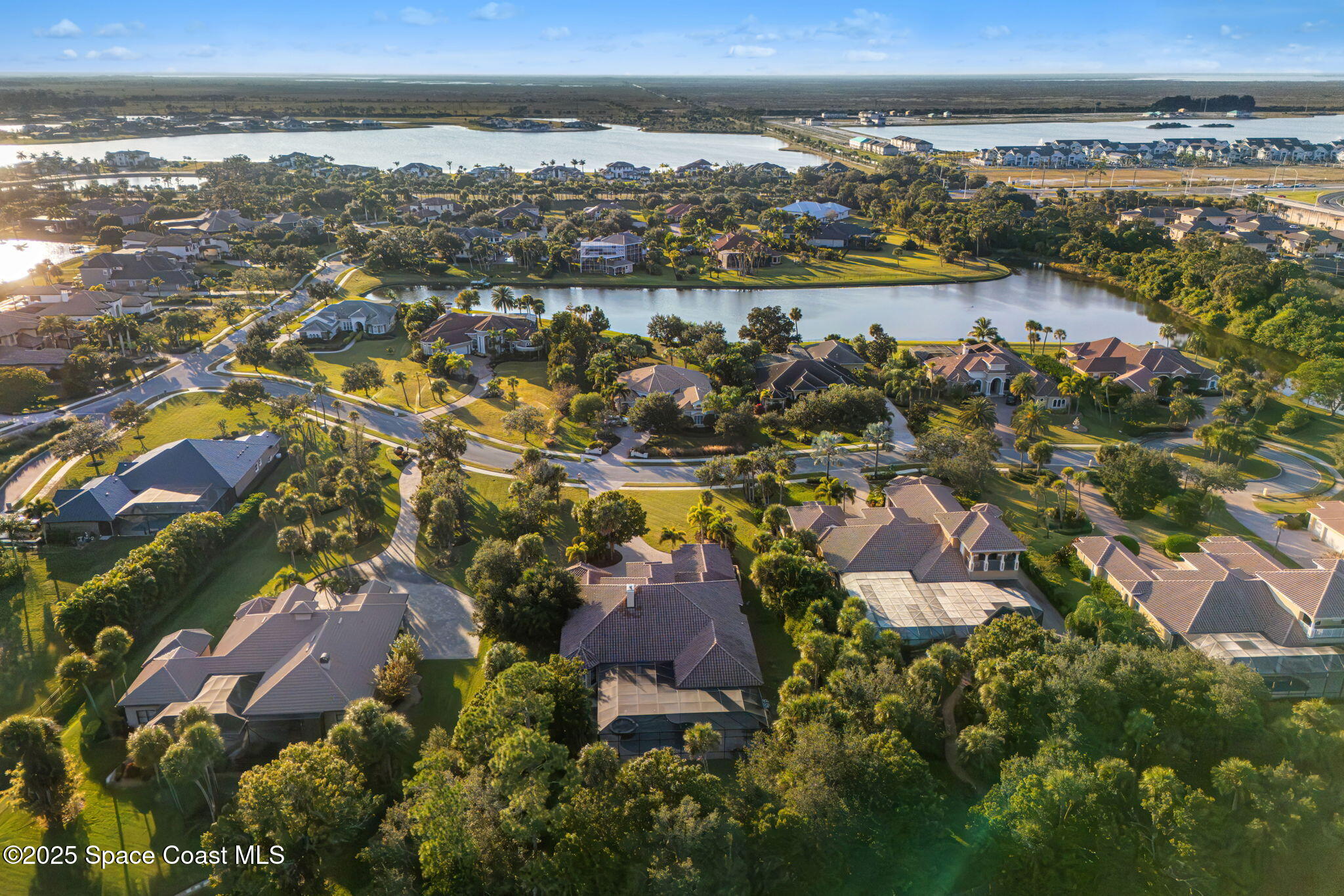4447 Reseda Way Rockledge, FL 32955 - Photo 79 of 87 an aerial view of residential building with outdoor space and ocean view