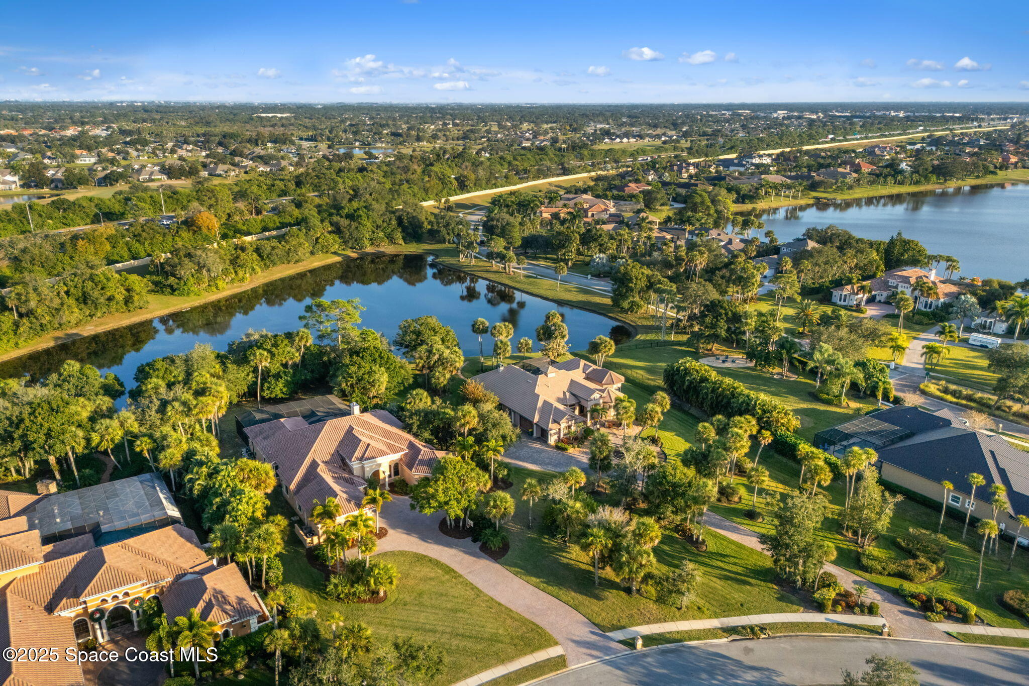 4447 Reseda Way Rockledge, FL 32955 - Photo 82 of 87 an aerial view of residential houses with outdoor space