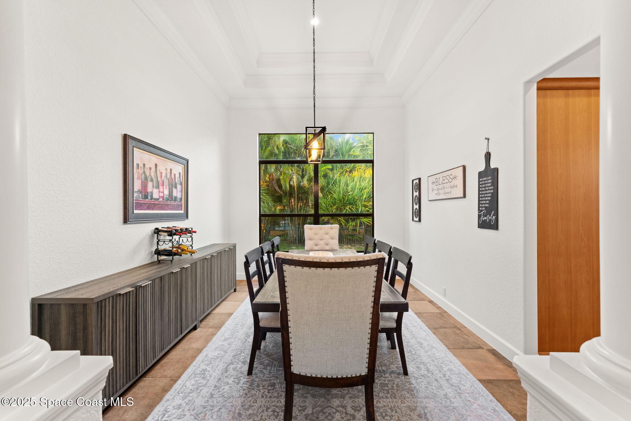 4447 Reseda Way Rockledge, FL 32955 - Photo 9 of 87 a dining room with furniture and window