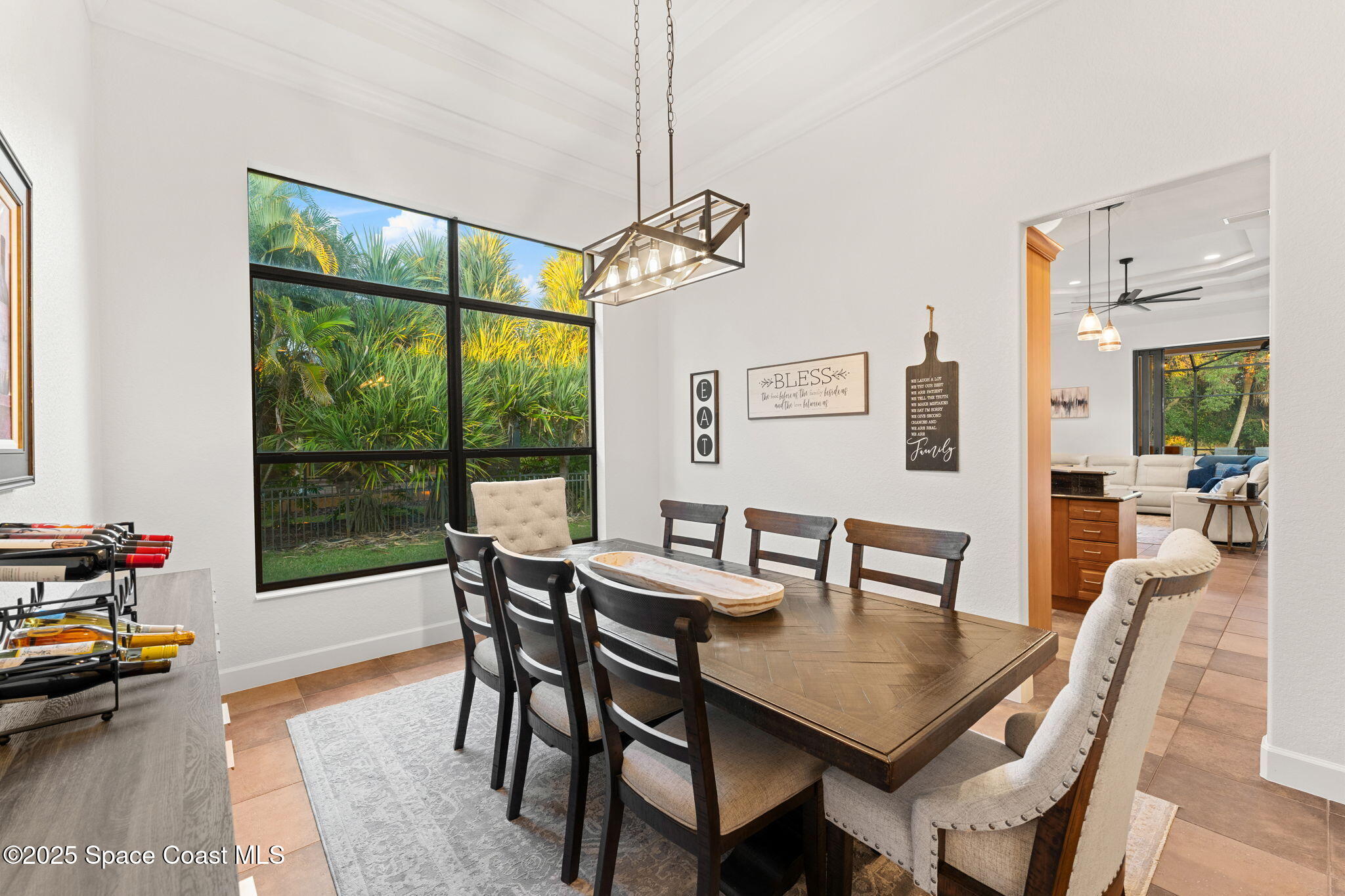 4447 Reseda Way Rockledge, FL 32955 - Photo 10 of 87 a view of a dining room with furniture window and outside view