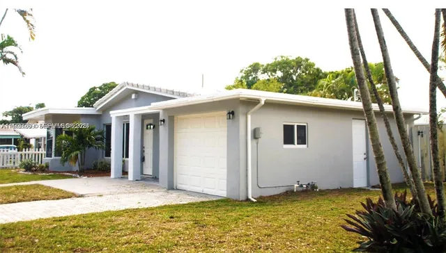 a house with trees in the background
