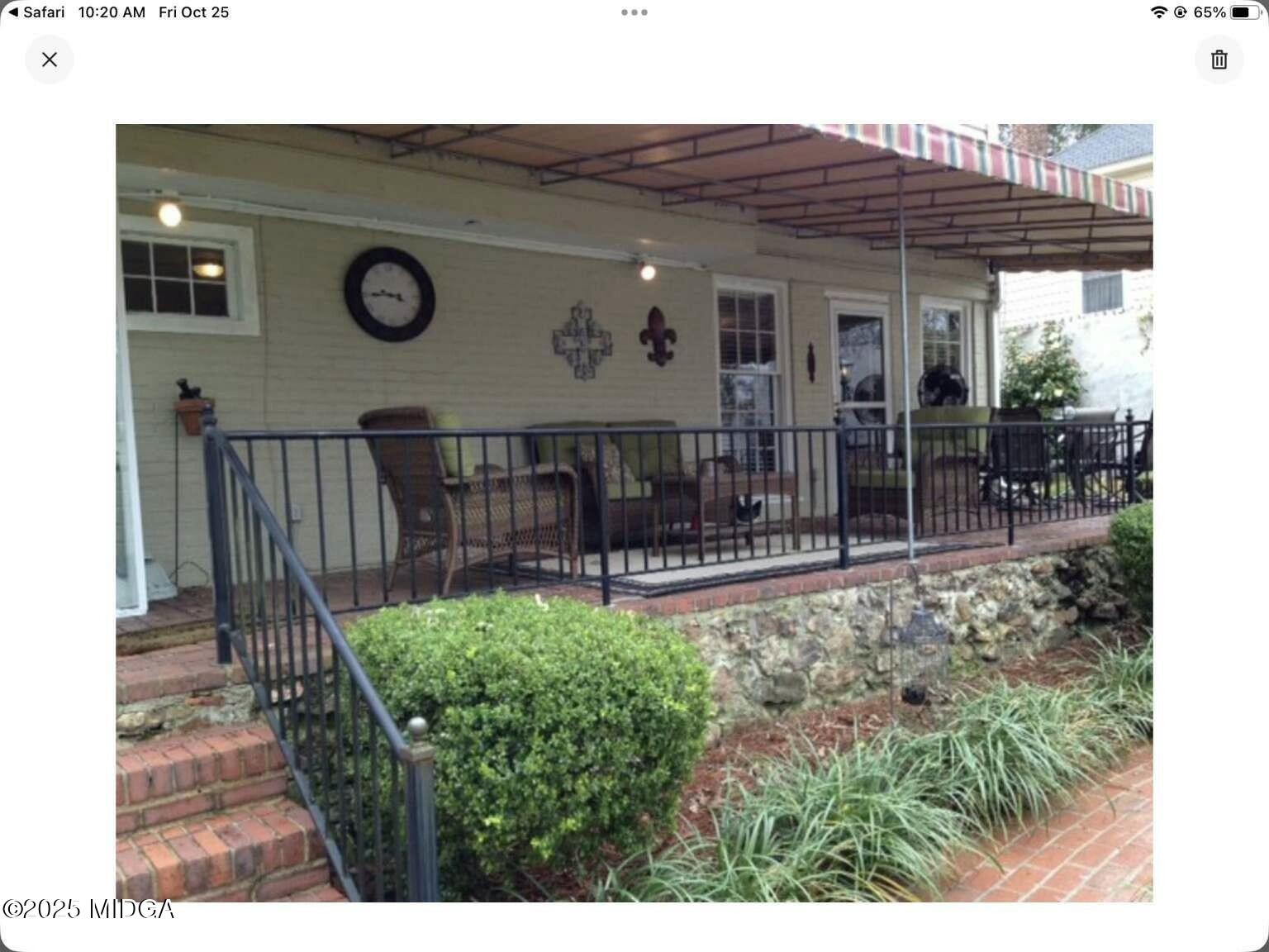 1057 Bond Street Macon, GA 31201 - Photo 14 of 27 a view of a porch with furniture and garden