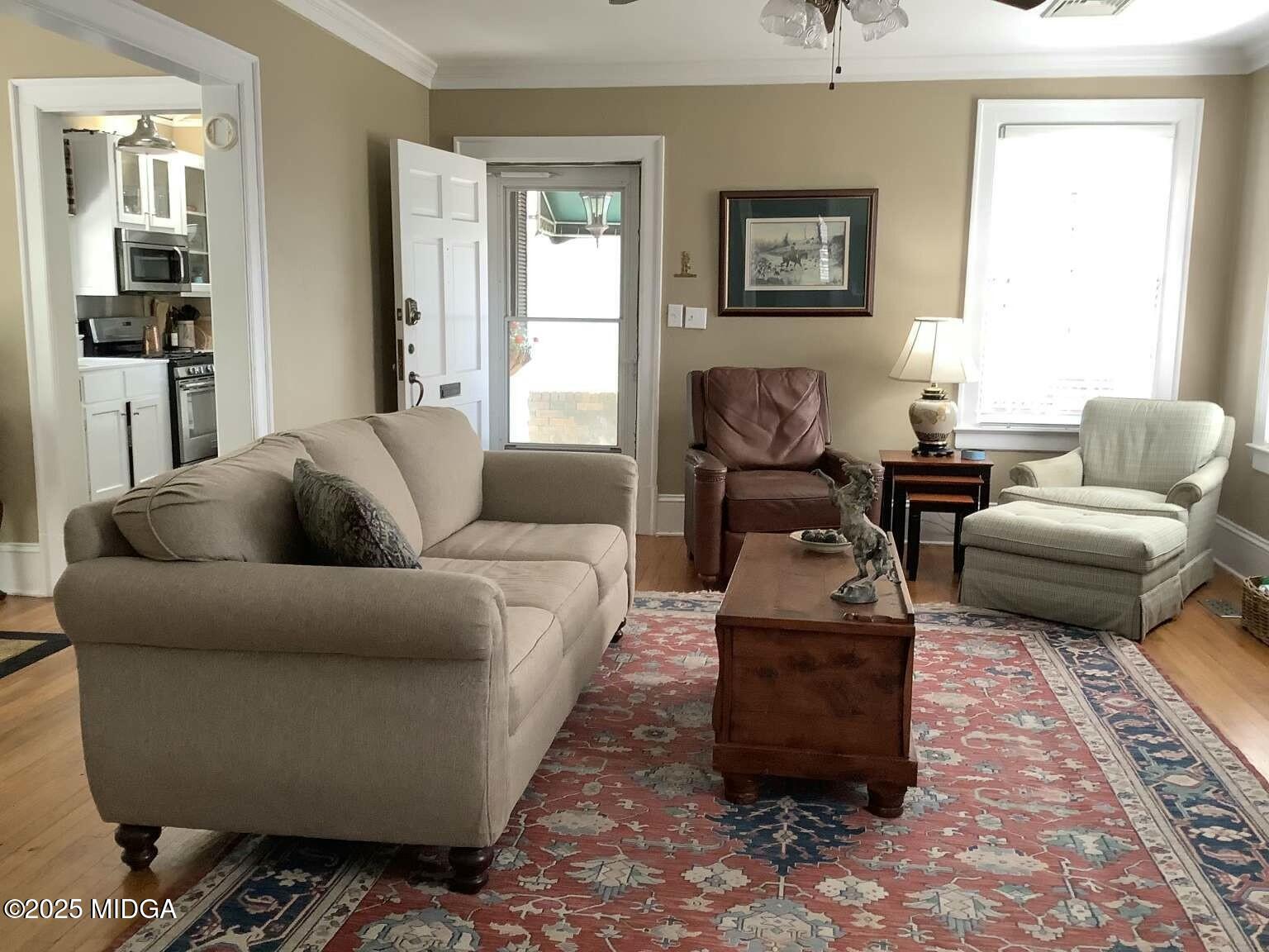 1057 Bond Street Macon, GA 31201 - Photo 21 of 27 a living room with furniture and a window
