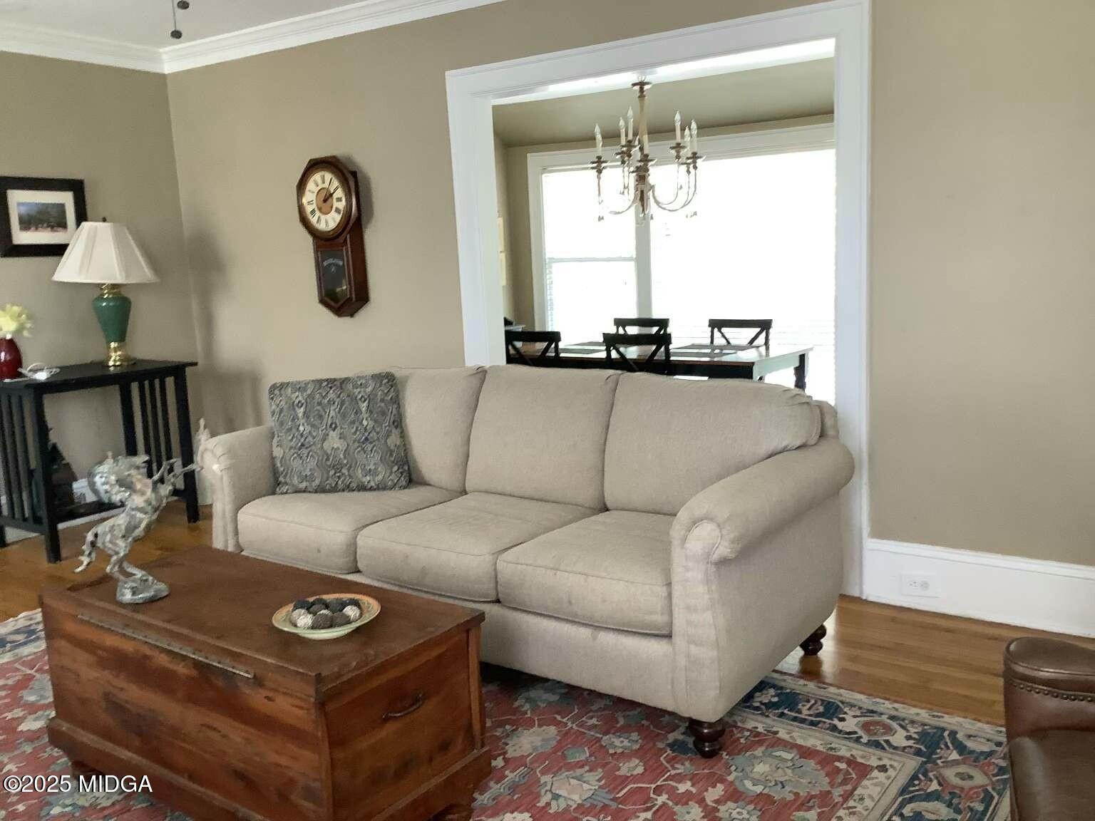 1057 Bond Street Macon, GA 31201 - Photo 22 of 27 a living room with furniture and a window