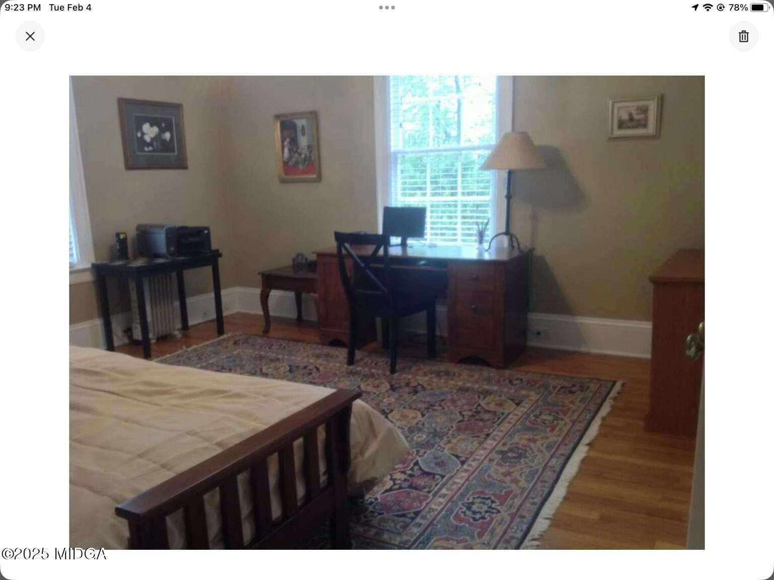 1057 Bond Street Macon, GA 31201 - Photo 7 of 27 a living room with a table and a window
