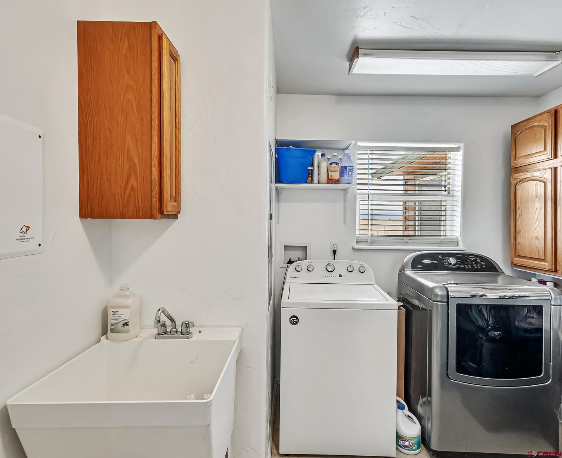 19632 E Road Delta, CO 81416 - Photo 32 of 45 a utility room with dryer and washer