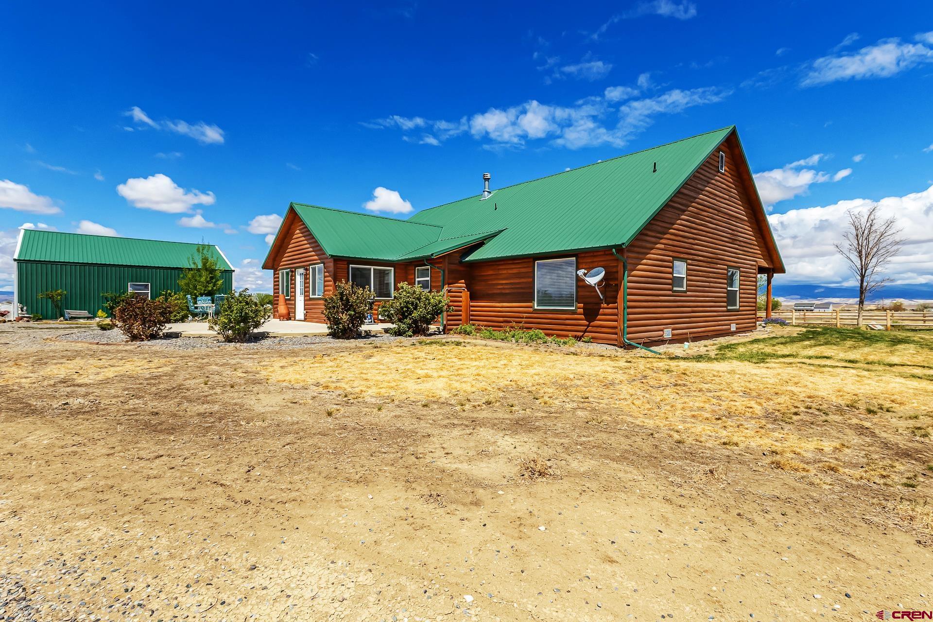 19632 E Road Delta, CO 81416 - Photo 39 of 45 a view of swimming pool with outdoor seating