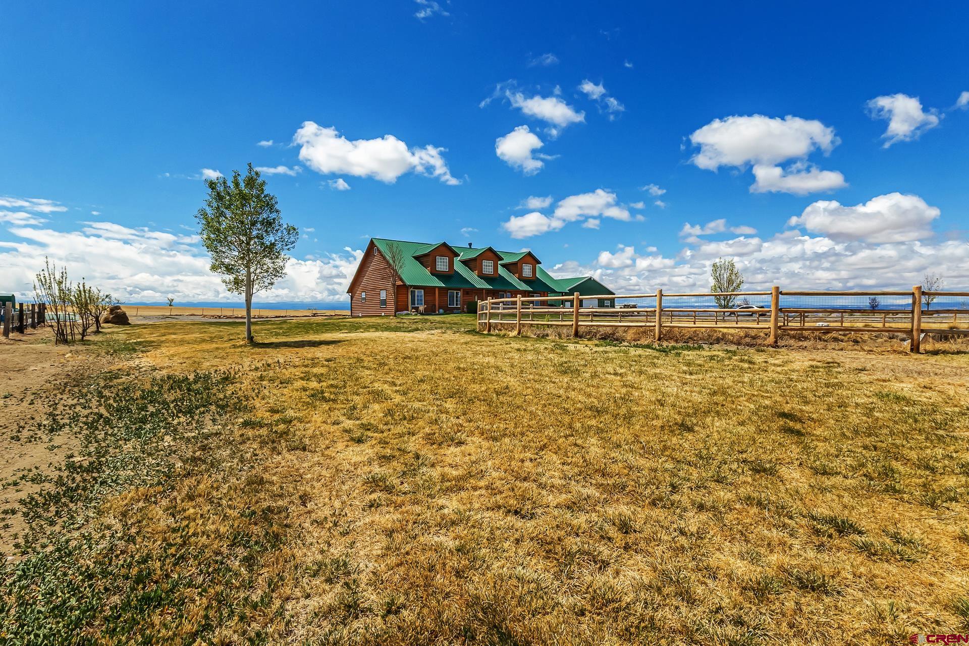 19632 E Road Delta, CO 81416 - Photo 4 of 45 a view of a swimming pool with an outdoor space
