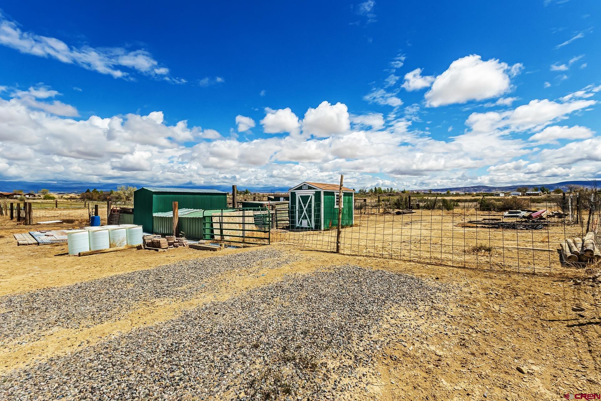19632 E Road Delta, CO 81416 - Photo 43 of 45 a view of a house with a yard