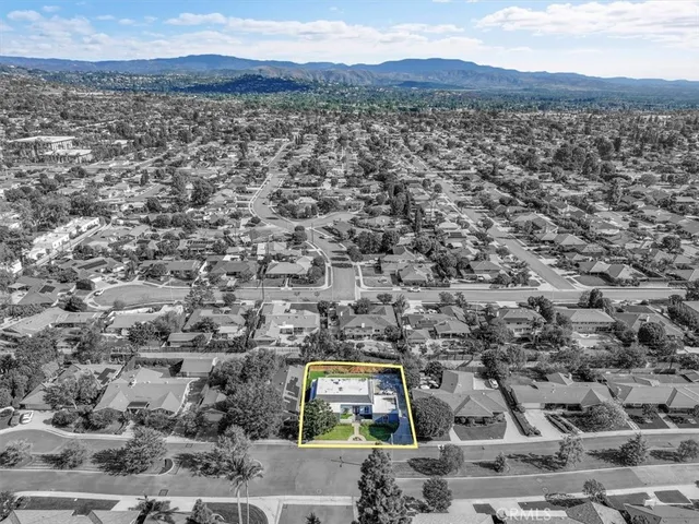 a view of a city with mountain