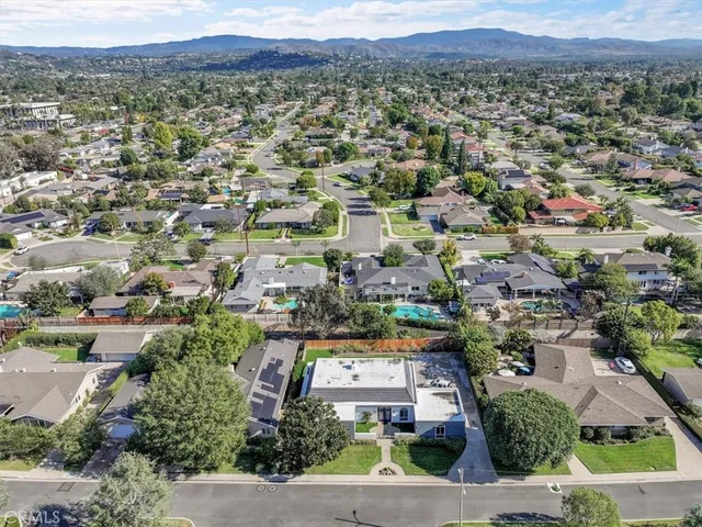an aerial view of a city with lots of residential buildings