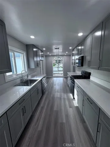 a large kitchen with a lot of counter space