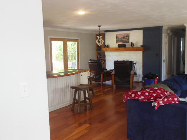 6266 Piney Woods Road Riner, VA 24149 - Photo 7 of 33 a living room with furniture and a fireplace