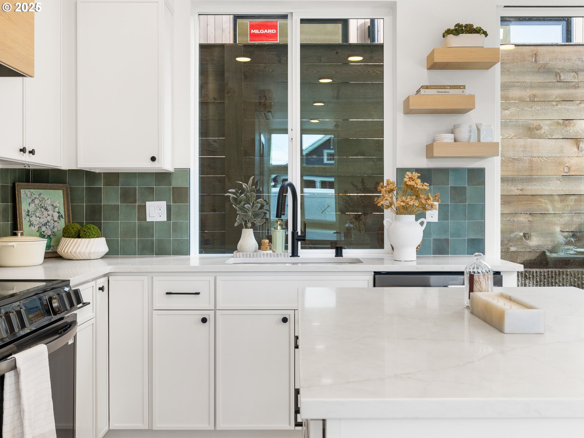 1911 Broadway Street, Unit 1 Vancouver, WA 98663 - Photo 12 of 25 a kitchen with a sink and cabinets