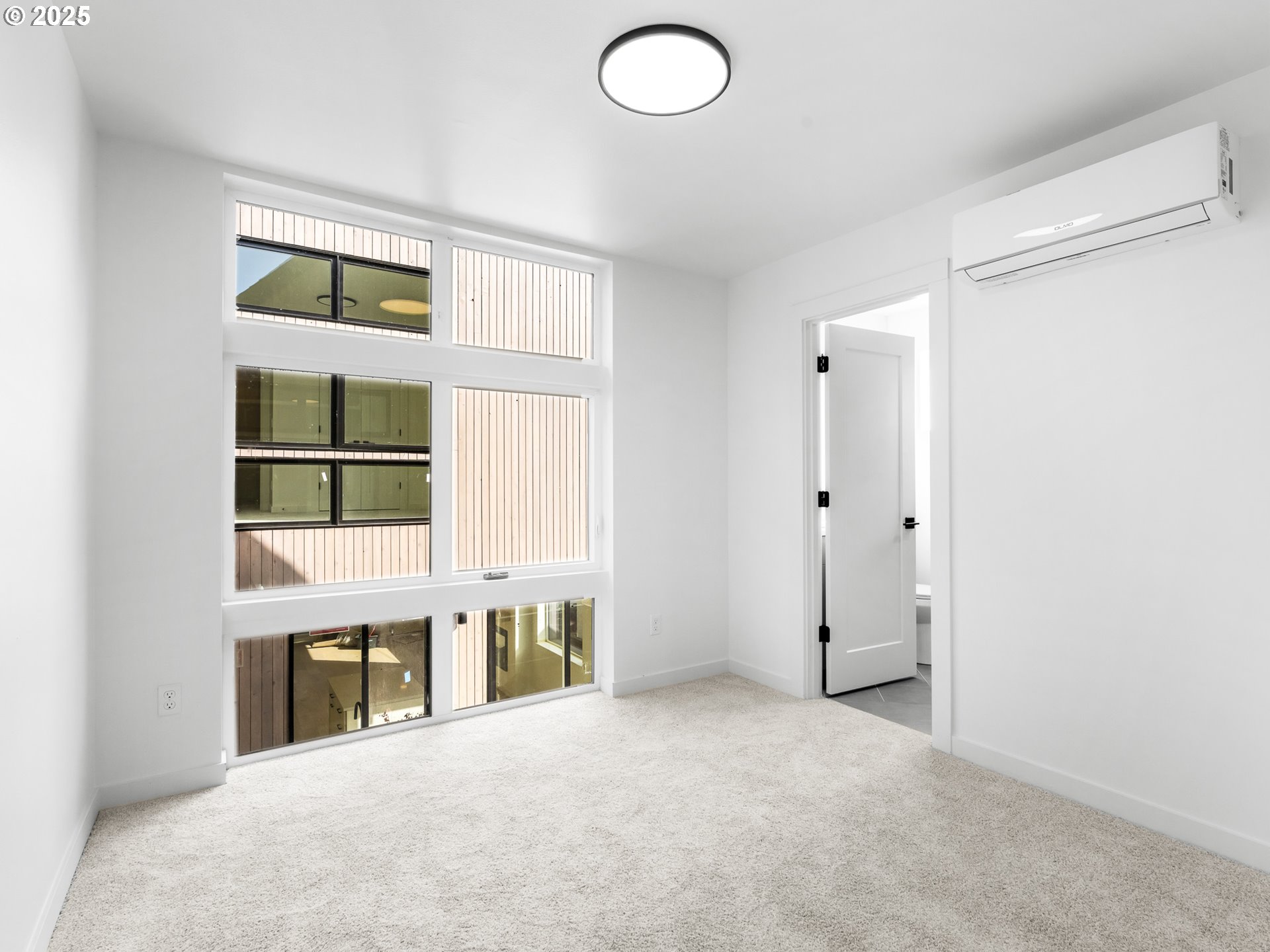 1911 Broadway Street, Unit 1 Vancouver, WA 98663 - Photo 15 of 25 a view of an empty room with a window