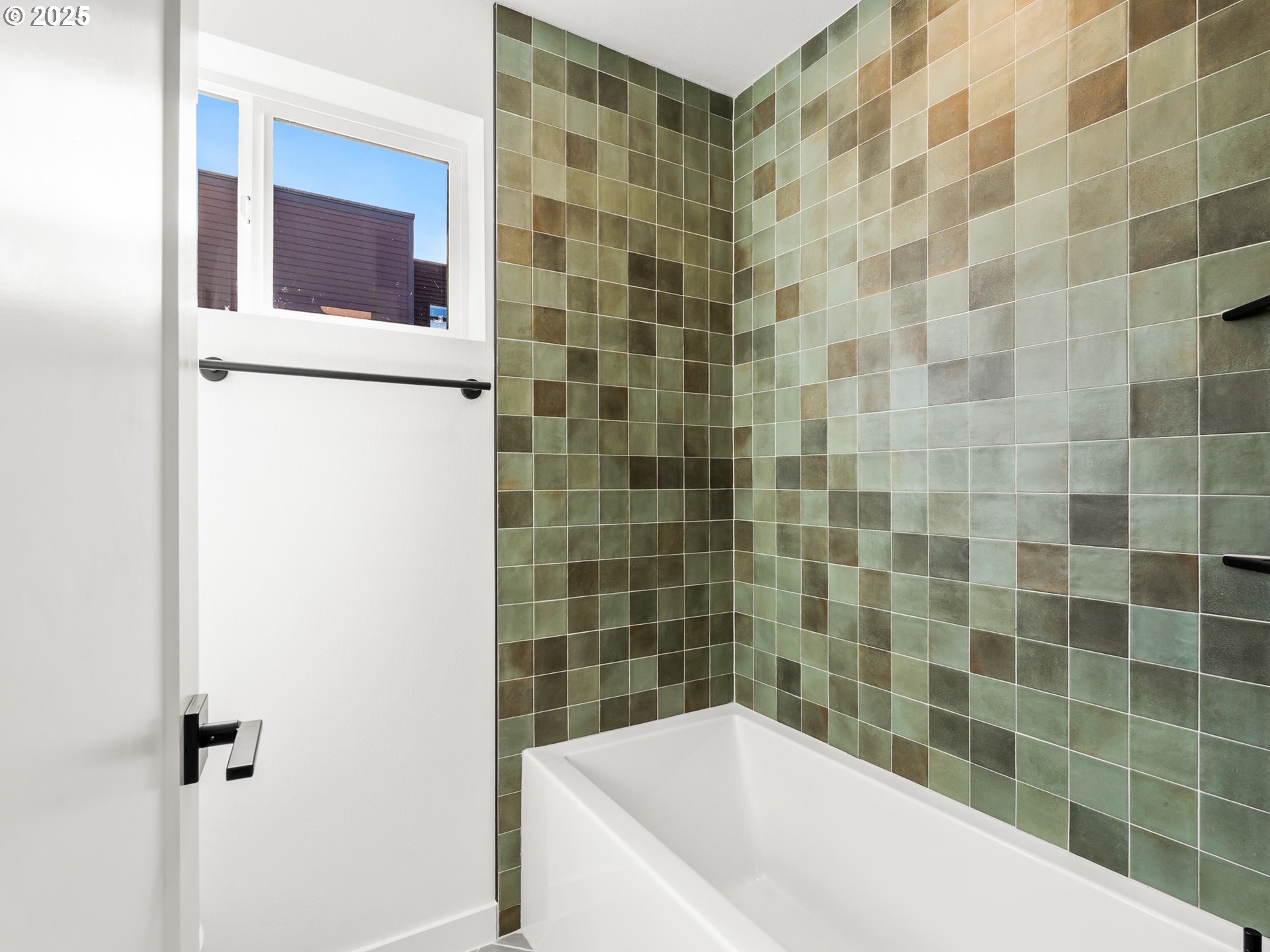 1911 Broadway Street, Unit 1 Vancouver, WA 98663 - Photo 16 of 25 a bathroom with a bathtub and shower