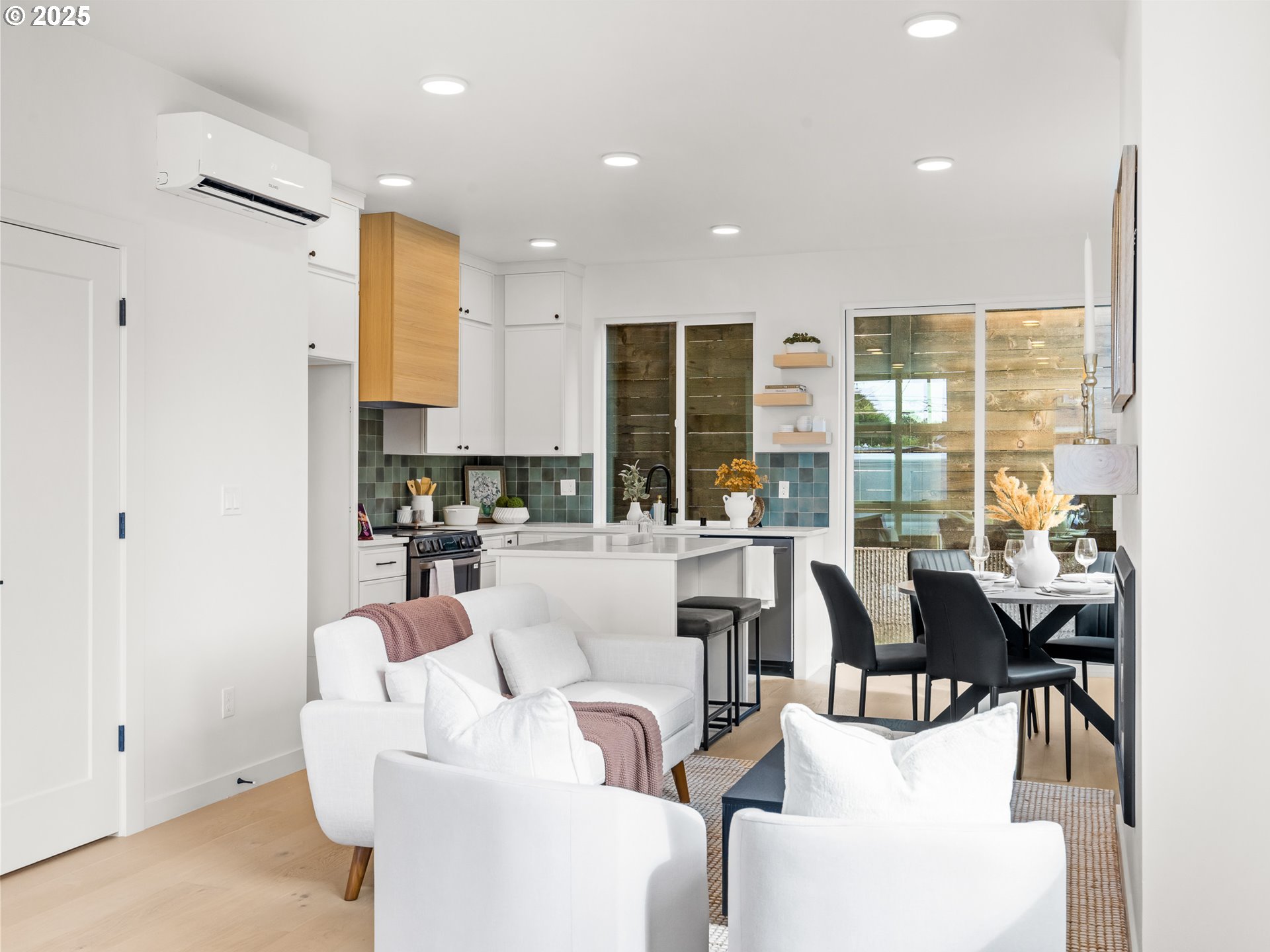 1911 Broadway Street, Unit 1 Vancouver, WA 98663 - Photo 9 of 25 a living room with furniture and large windows