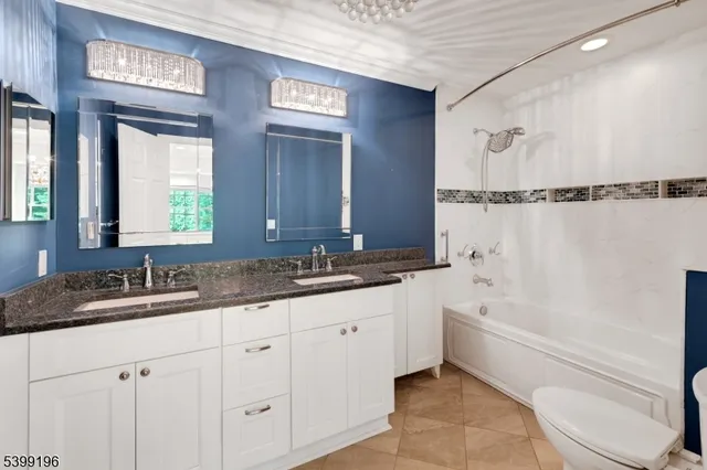 a view of a bedroom with windows