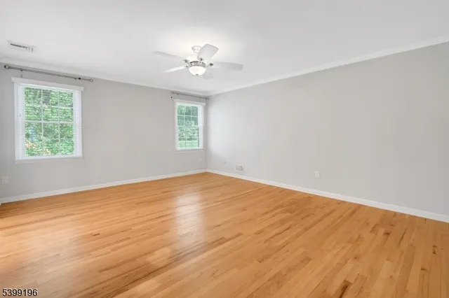 a view of a backyard with sitting area
