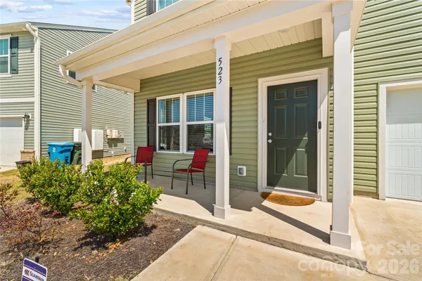 a house view with a outdoor space