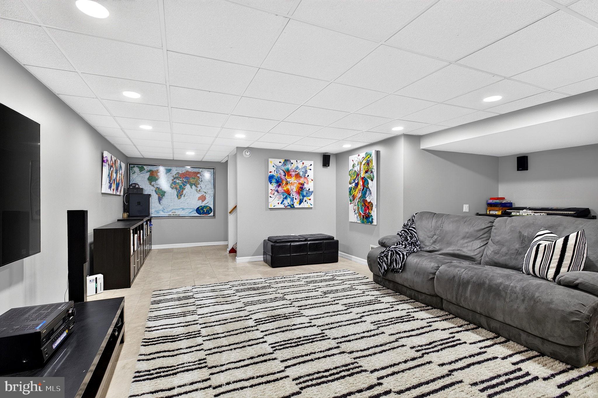 321 Buttonwood Street Hamilton, NJ 08619 - Photo 31 of 42 Finished basement recreation space