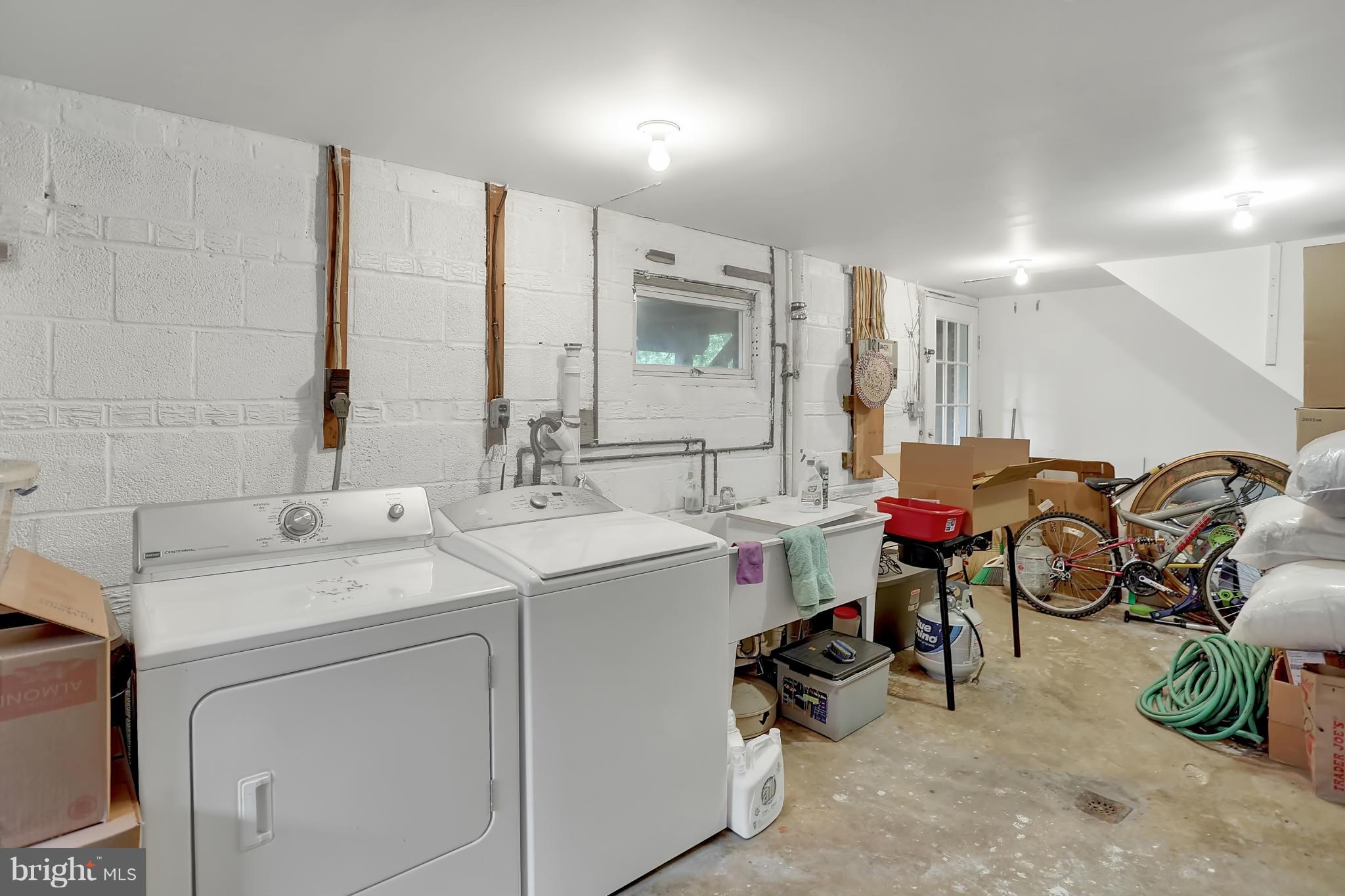 6217 Hanover Avenue Springfield, VA 22150 - Photo 23 of 30 Basement utility room w/ washer and dryer