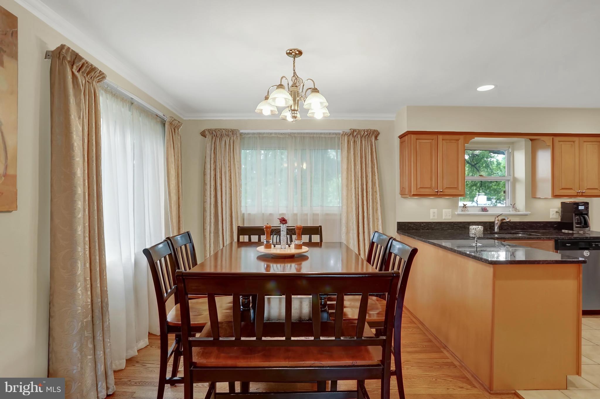 6217 Hanover Avenue Springfield, VA 22150 - Photo 3 of 30 Elegant dining room adjacent to the kitchen