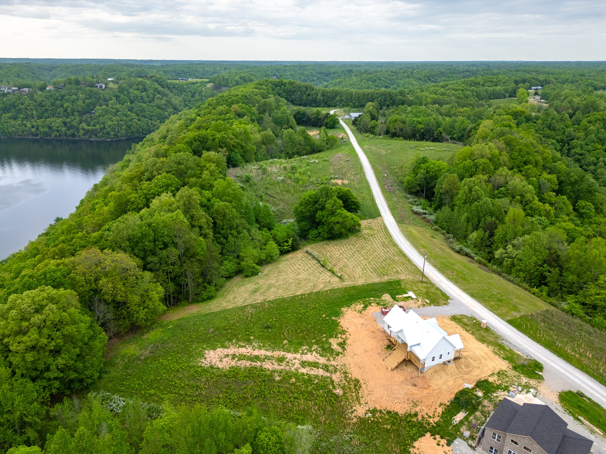 0 Lake Bluff Baxter, TN 38544 - Photo 5 of 23 a view of a water pond with green yard