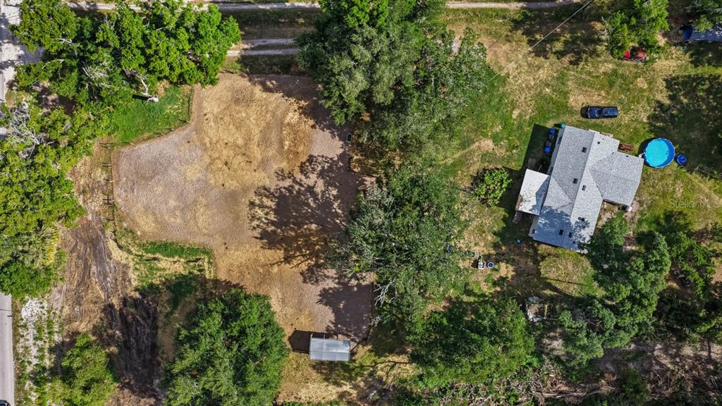 5614 Watson Road Riverview, FL 33578 - Photo 2 of 6 an aerial view of a house with a yard and garden