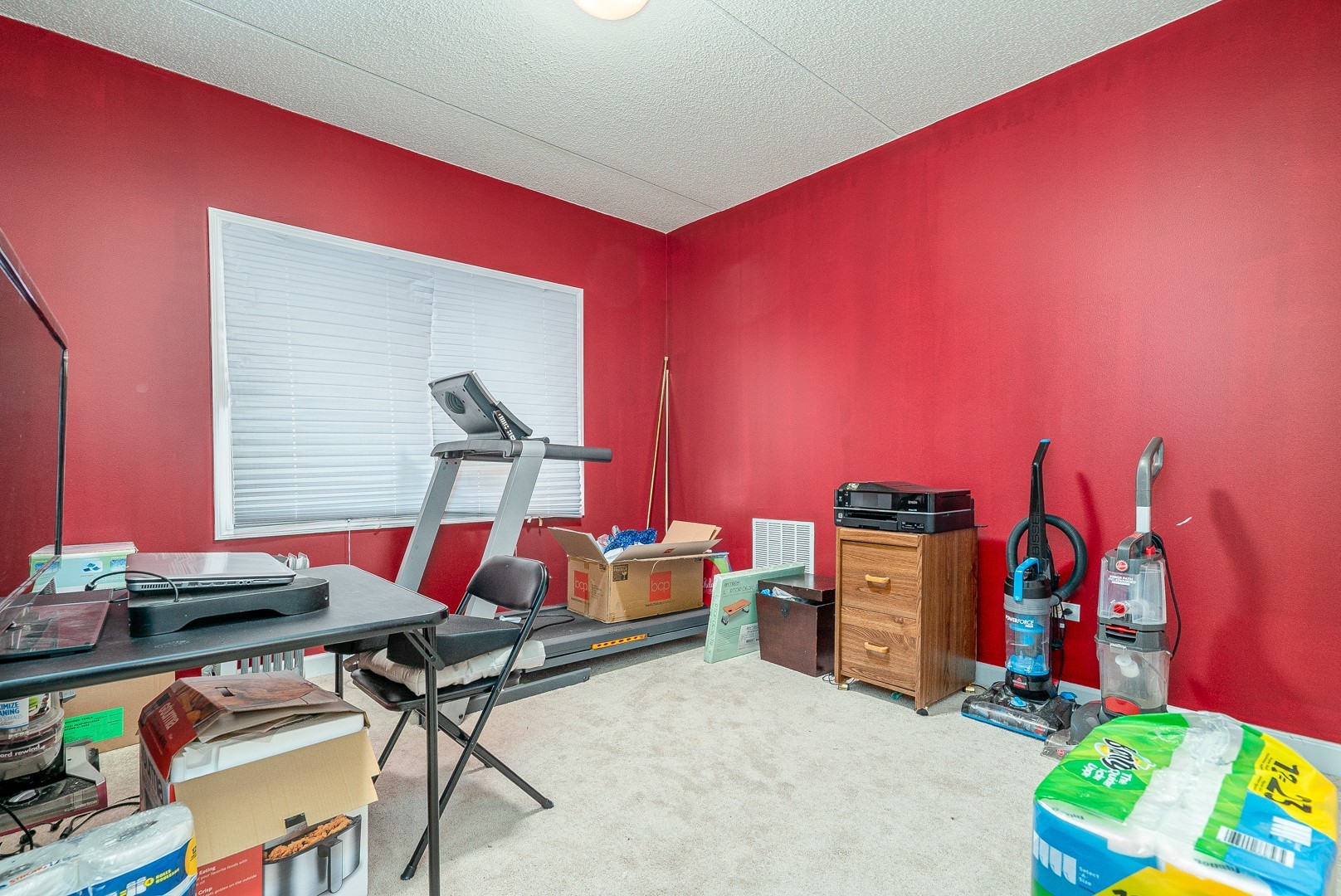 77 North Wolf Road, Unit 507 Northlake, IL 60164 - Photo 12 of 15 a living room with furniture and a flat screen tv