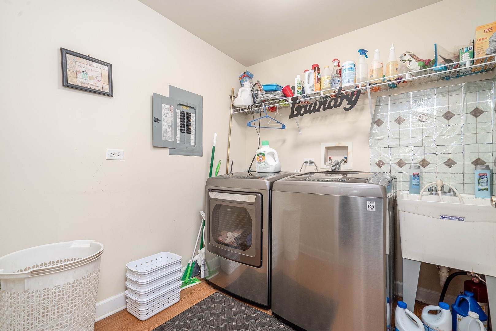 77 North Wolf Road, Unit 507 Northlake, IL 60164 - Photo 14 of 15 a utility room with fridge dryer and washer