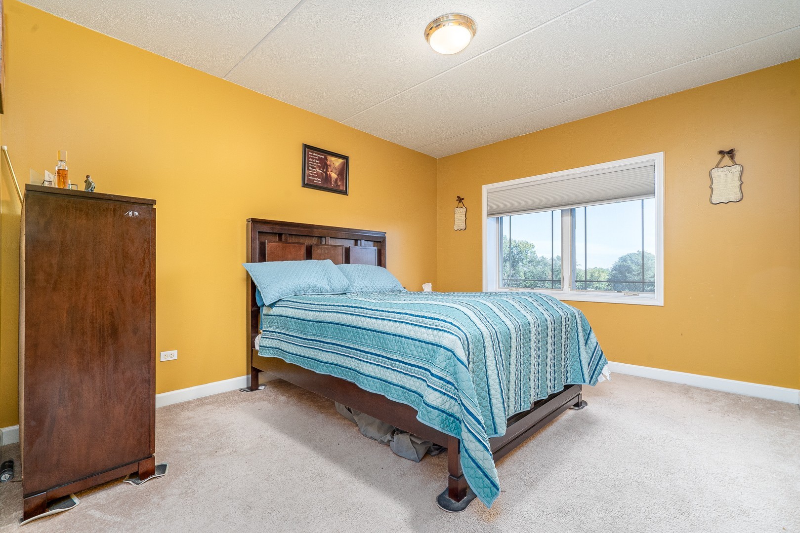 77 North Wolf Road, Unit 507 Northlake, IL 60164 - Photo 9 of 15 a bedroom with a bed and window