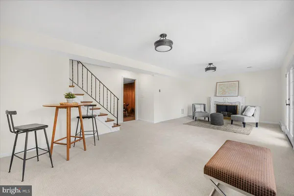 a livingroom with furniture and a chair