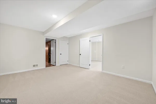 an empty room with an entryway