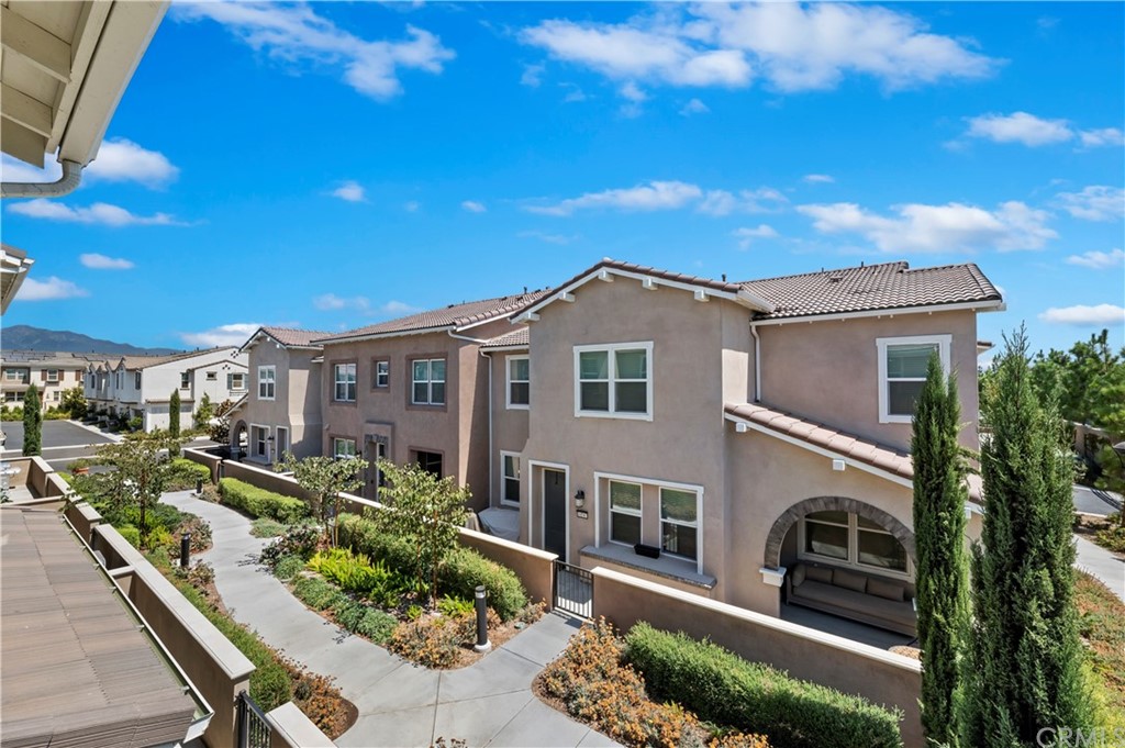 14557 Sienna Place Eastvale, CA 92880 - Photo 29 of 35 a view of a balcony with chairs
