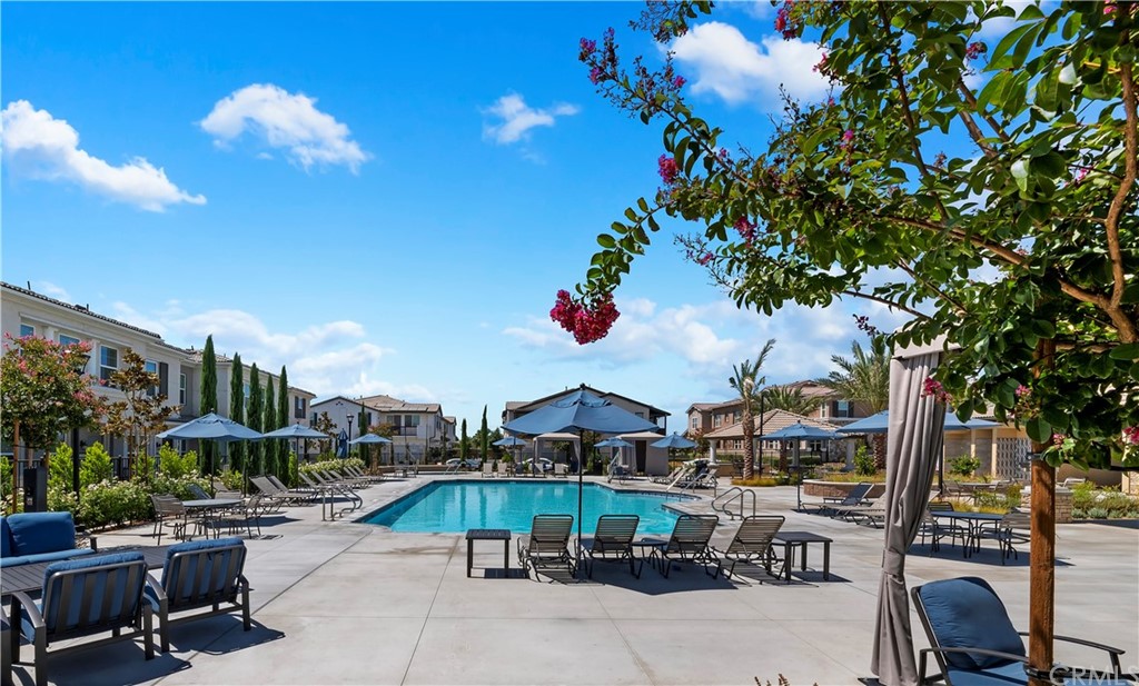 14557 Sienna Place Eastvale, CA 92880 - Photo 32 of 35 a view of a chairs and tables in the patio