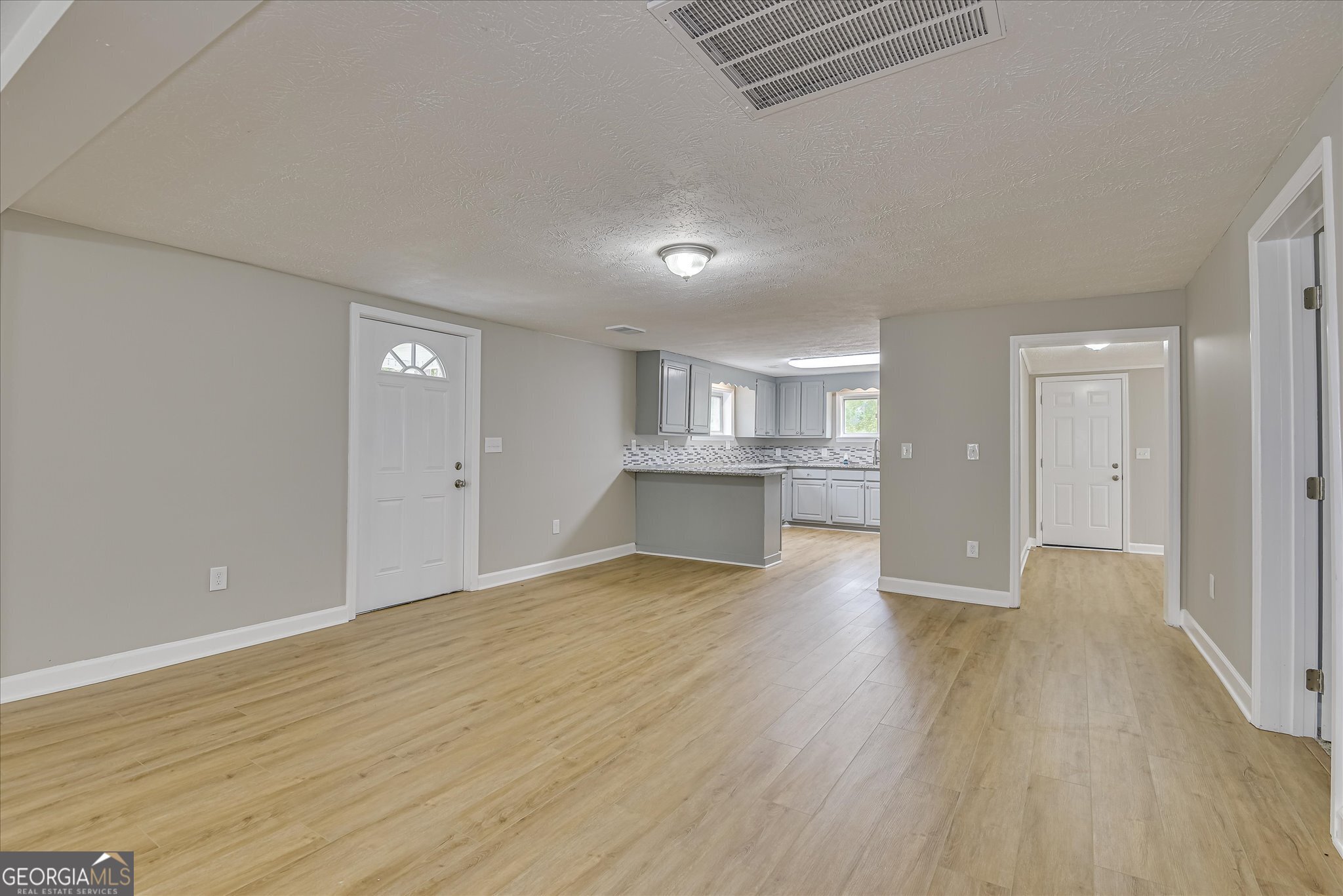 1321 Brett Road Wadley, GA 30477 - Photo 14 of 47 a view of empty room with wooden floor