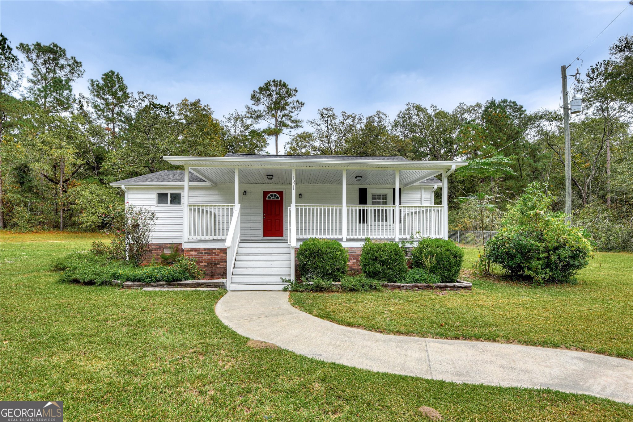 1321 Brett Road Wadley, GA 30477 - Photo 2 of 47 a front view of a house with a yard