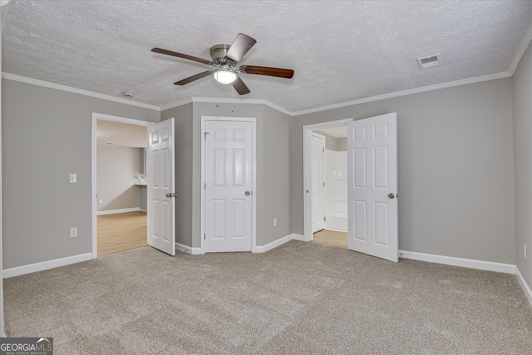 1321 Brett Road Wadley, GA 30477 - Photo 32 of 47 a view of an empty room with a ceiling fan