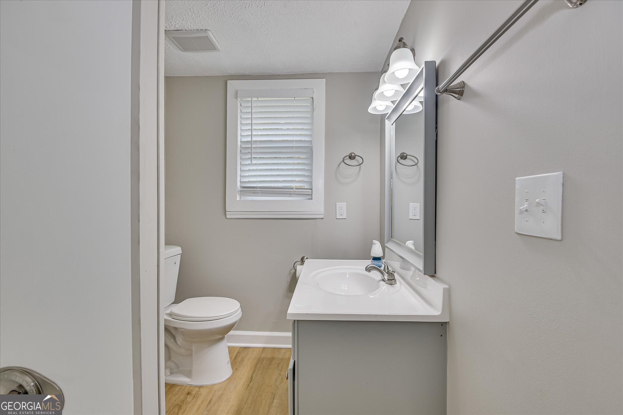 1321 Brett Road Wadley, GA 30477 - Photo 34 of 47 a bathroom with a sink toilet and shower