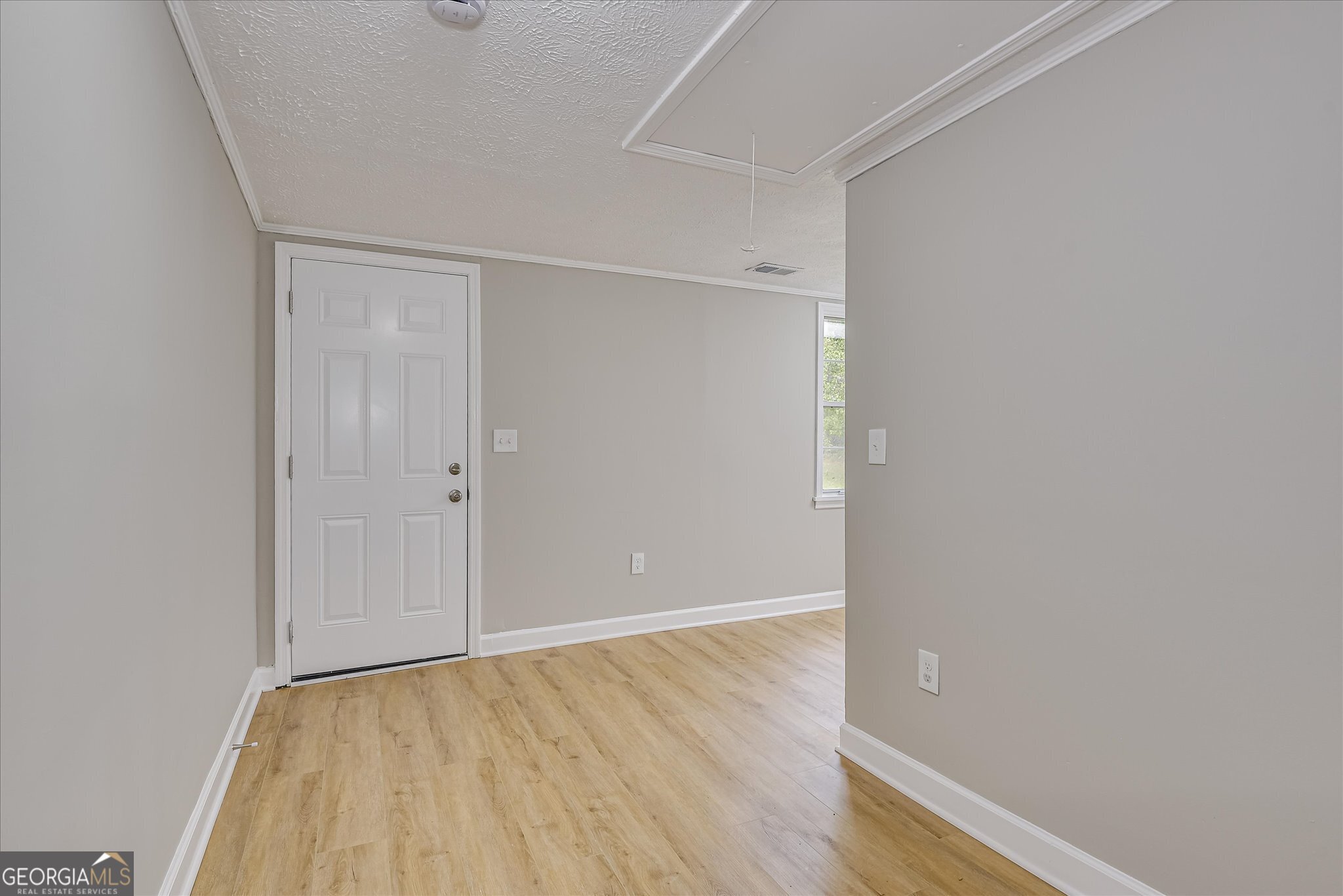 1321 Brett Road Wadley, GA 30477 - Photo 35 of 47 a view of an empty room with wooden floor