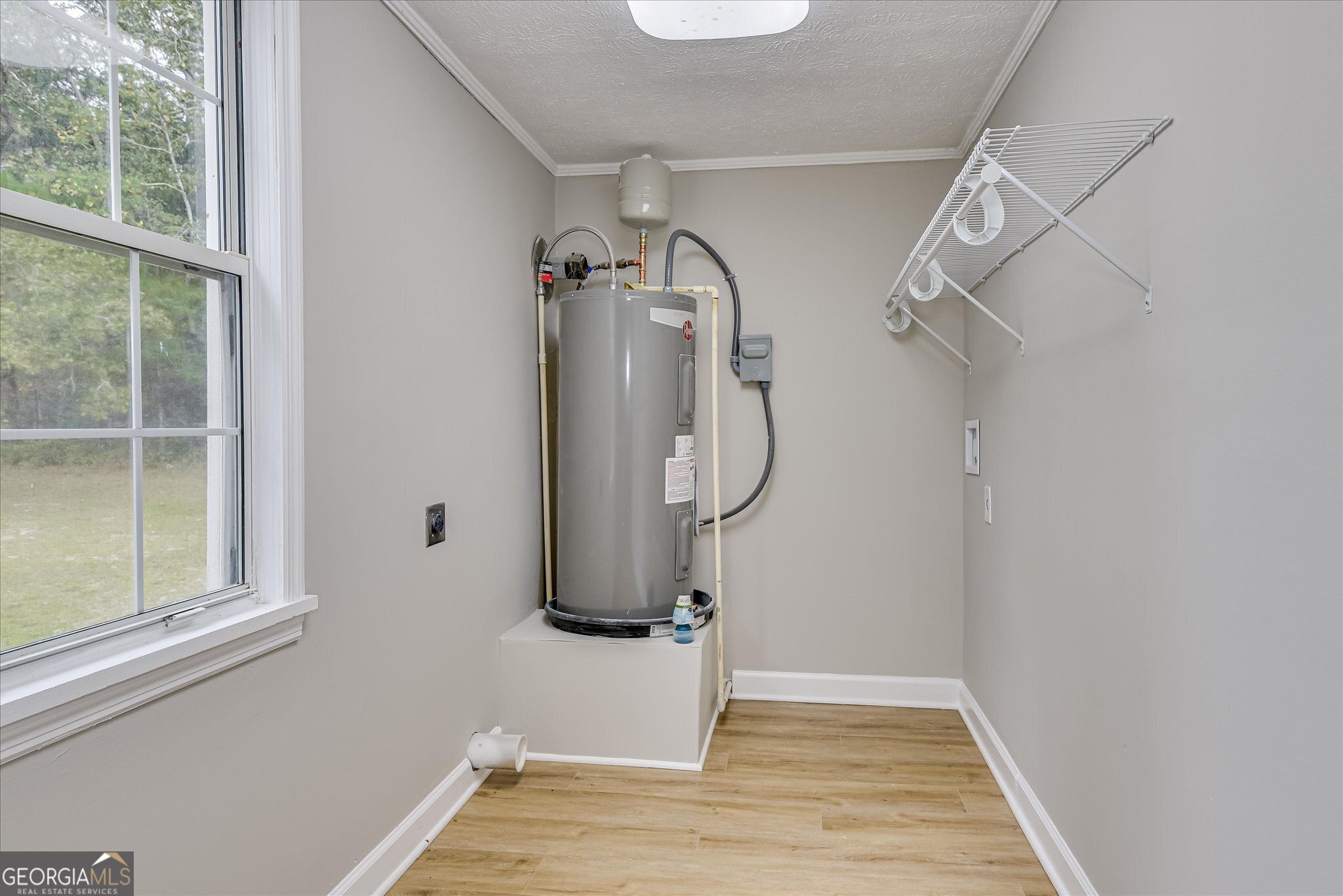 1321 Brett Road Wadley, GA 30477 - Photo 37 of 47 a view of a room with wooden floor and windows