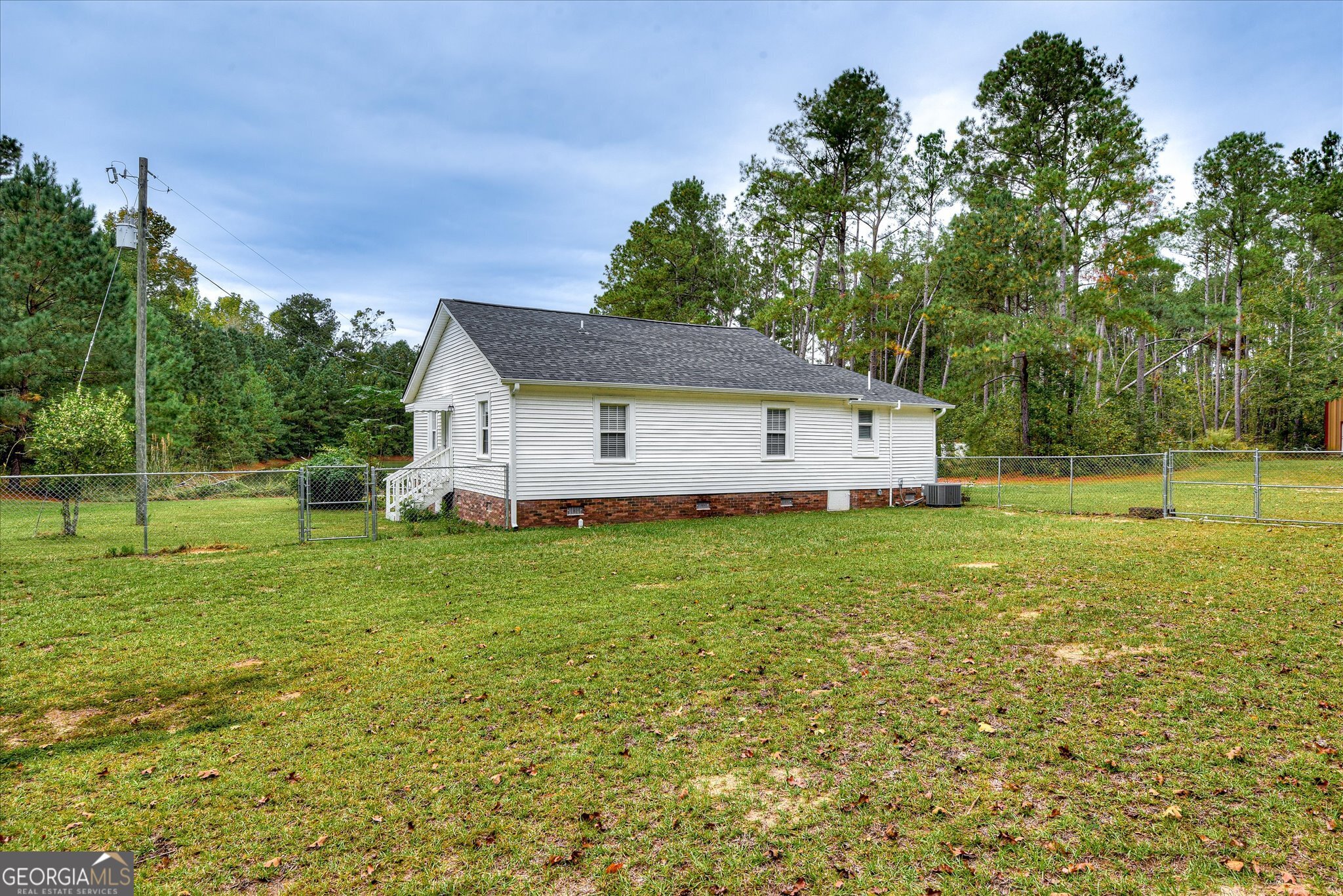 1321 Brett Road Wadley, GA 30477 - Photo 38 of 47 a view of a house with a yard