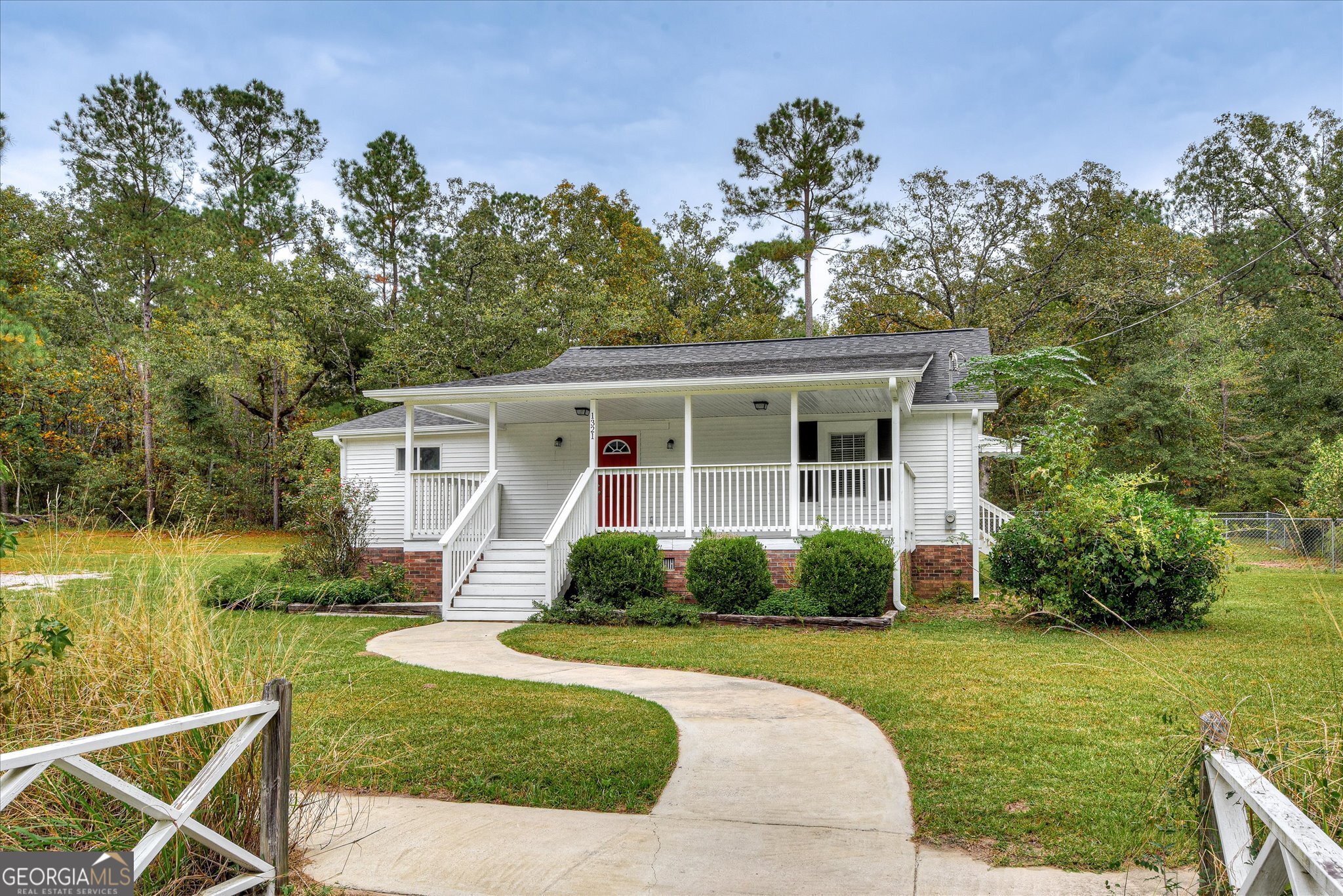 1321 Brett Road Wadley, GA 30477 - Photo 4 of 47 a front view of a house with garden